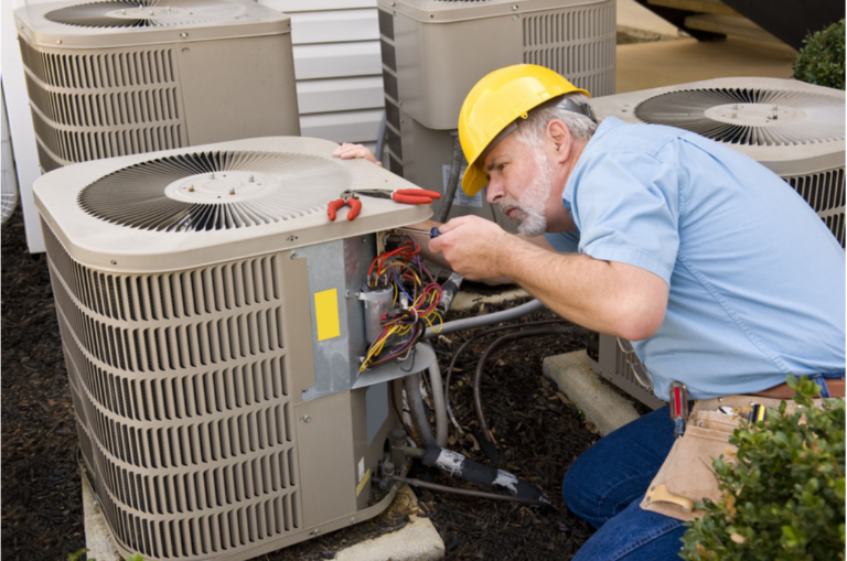 HVAC worker providing AC maintenance
